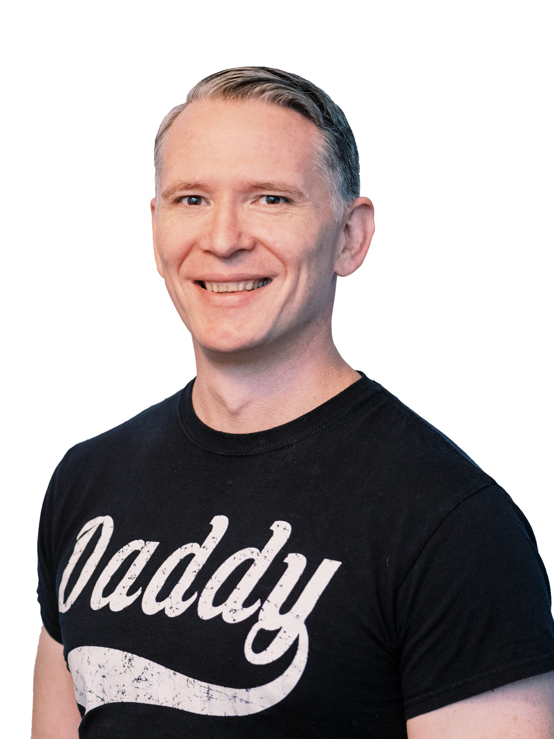 Headshot of Mike Johnson (host of Gayish podcast) smiling and looking at the camera. He's wearing a black shirt with the word "Daddy" written on it. White background.